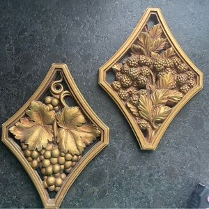 Set of 2 Vtg gold colored wall plaques